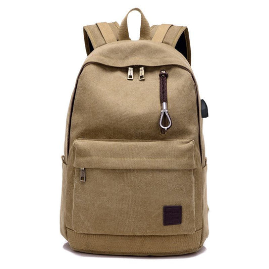 Canvas backpack with built-in USB charging port and laptop compartment