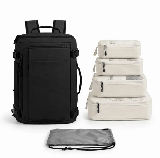 Smart Traveler Set featuring a black water-resistant Oxford fabric backpack with padded straps and four beige packing cubes with zip closures.